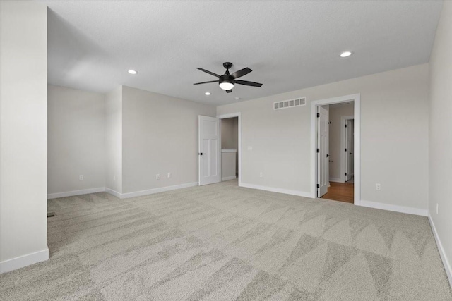 1991 S Warrior Ln, Waukee, IA 50263 - carpeted empty room with recessed lighting, ceiling fan, and baseboards