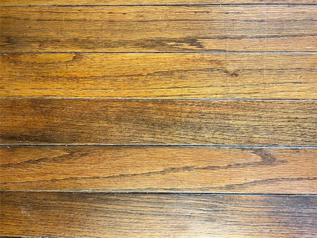 interior details featuring hardwood / wood-style flooring