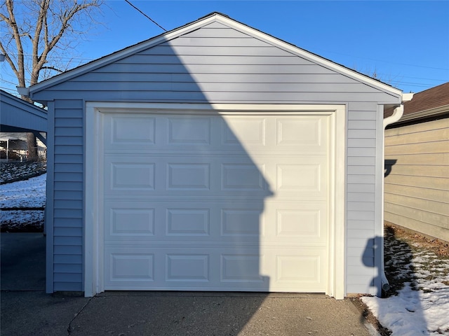 view of snow covered garage