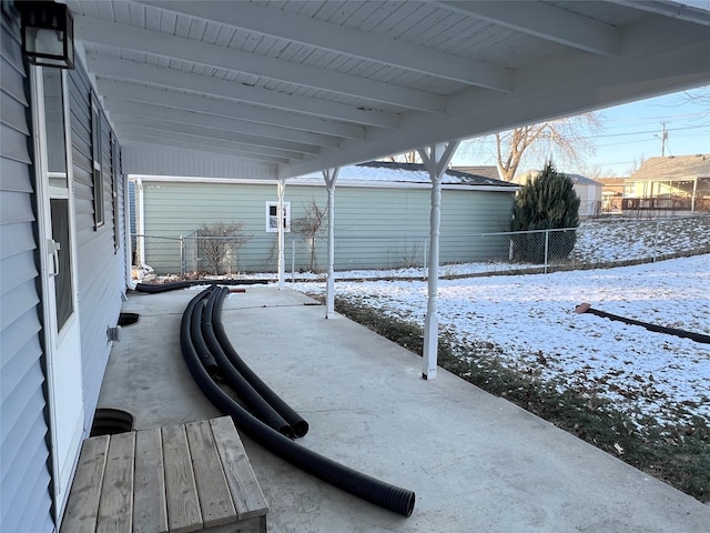 view of snow covered patio