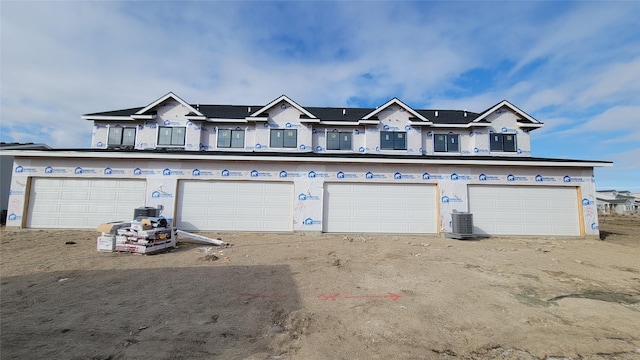 view of front of property featuring cooling unit