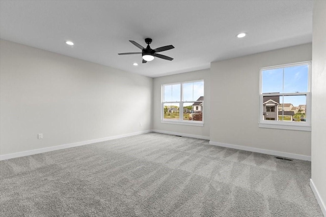 1995 S Warrior Ln, Waukee, IA 50263 - empty room with carpet flooring, recessed lighting, a ceiling fan, and baseboards