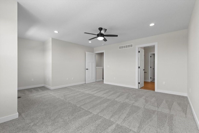 1995 S Warrior Ln, Waukee, IA 50263 - unfurnished bedroom with carpet floors, recessed lighting, baseboards, and ceiling fan