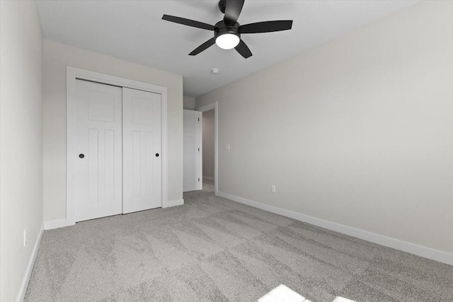 1995 S Warrior Ln, Waukee, IA 50263 - unfurnished bedroom featuring carpet flooring, a closet, and baseboards