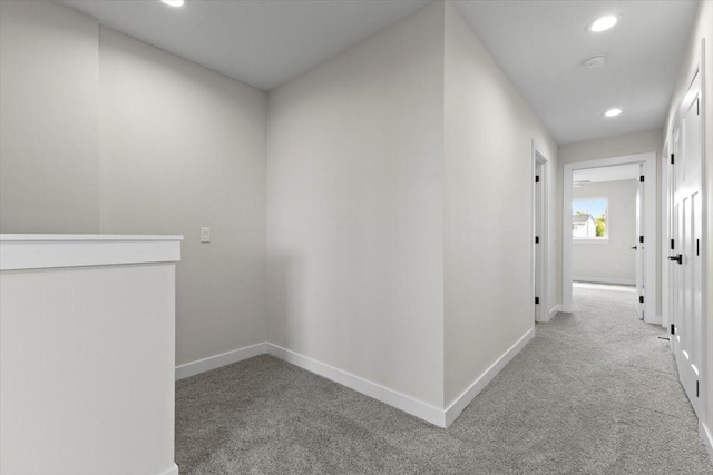 1995 S Warrior Ln, Waukee, IA 50263 - hallway featuring carpet flooring, recessed lighting, and baseboards