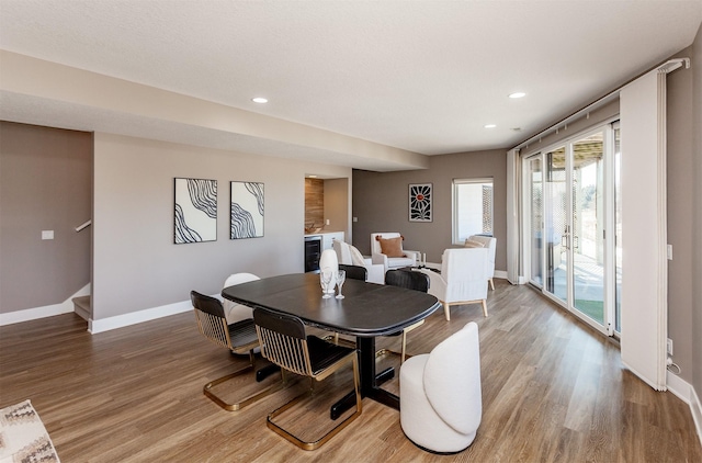 dining area featuring hardwood / wood-style floors