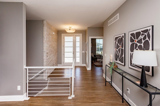 doorway featuring dark hardwood / wood-style floors