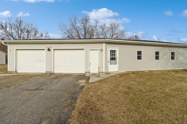 garage with a yard