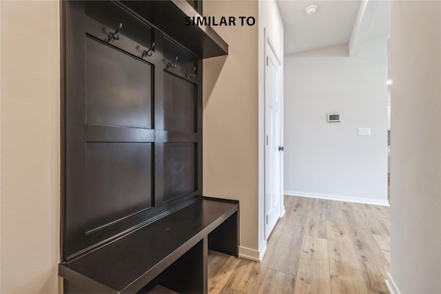 mudroom with light hardwood / wood-style floors