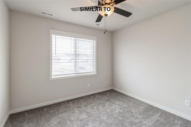 carpeted empty room with ceiling fan