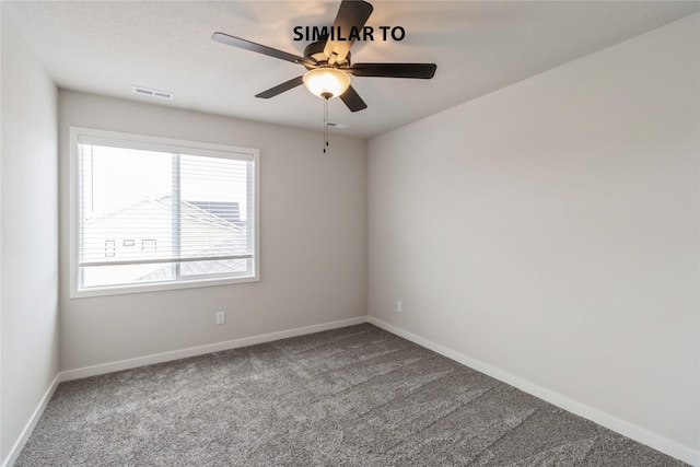 carpeted empty room featuring ceiling fan