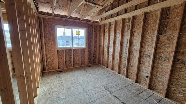 interior space featuring ceiling fan