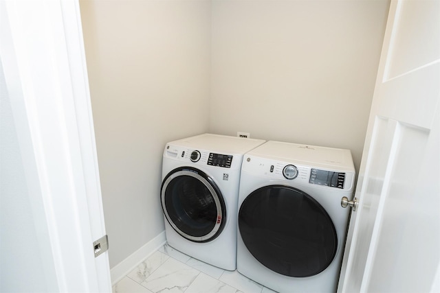 laundry area featuring washer and clothes dryer