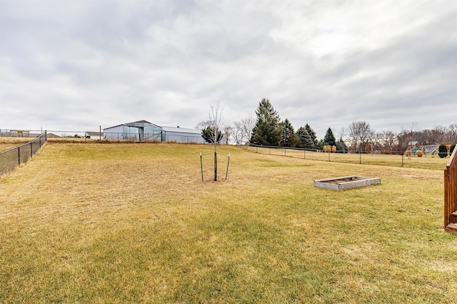 view of yard with a rural view