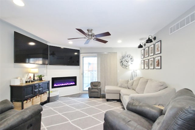 living room with ceiling fan