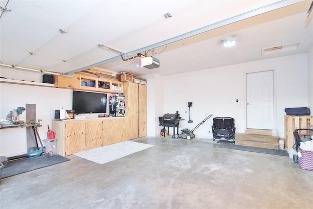 garage with a garage door opener