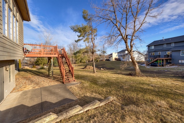 view of yard with a wooden deck