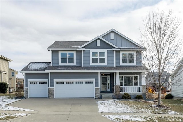 craftsman-style home with a garage and a porch