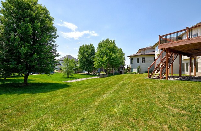 view of yard with a wooden deck