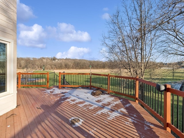 deck featuring a lawn