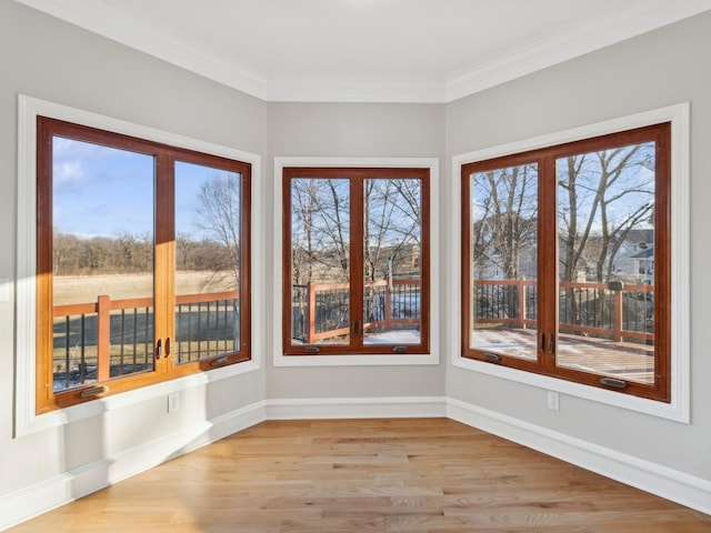 unfurnished sunroom with a wealth of natural light