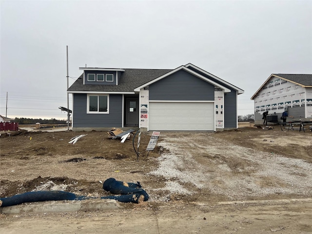 view of front of house with a garage