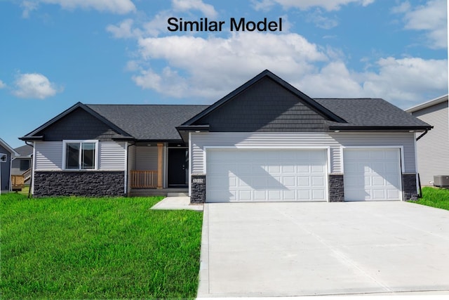 craftsman house with a front lawn, a garage, and cooling unit