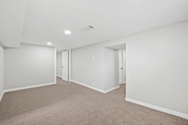 basement with carpet flooring