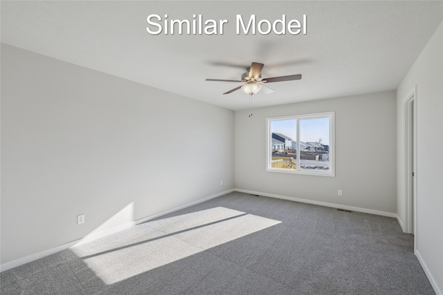 unfurnished bedroom featuring ceiling fan and carpet