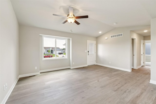 2008 White Oak Ln, Granger, IA 50109 - unfurnished room with a ceiling fan, lofted ceiling, and light wood-type flooring