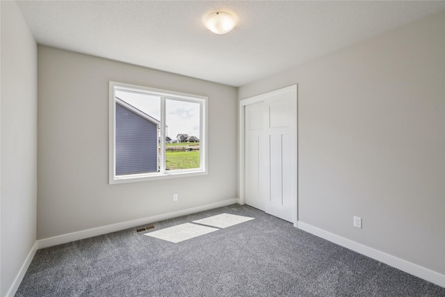 2008 White Oak Ln, Granger, IA 50109 - unfurnished bedroom with carpet floors