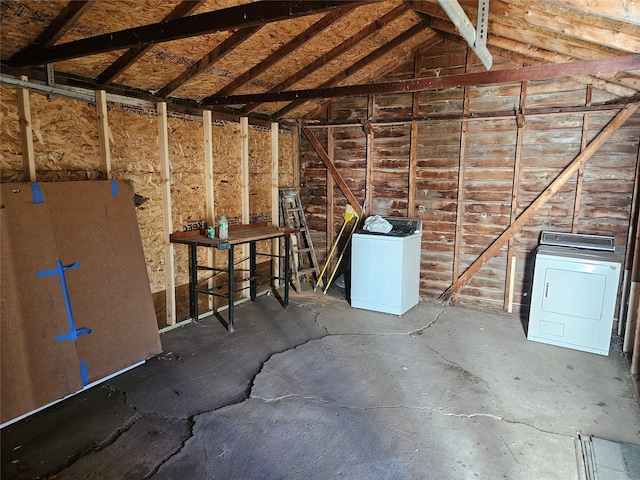 storage room featuring washer and clothes dryer