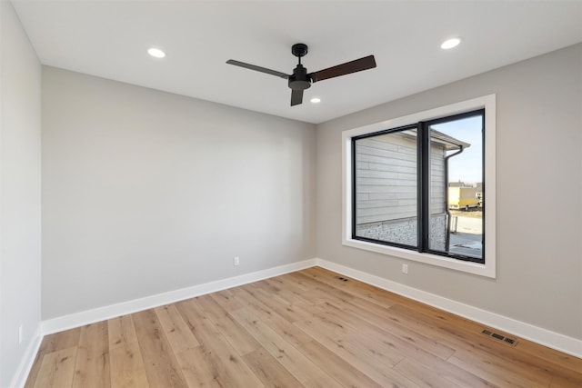 18256 Alderleaf Dr, Clive, IA 50325 - empty room featuring a ceiling fan, visible vents, recessed lighting, and light wood-type flooring