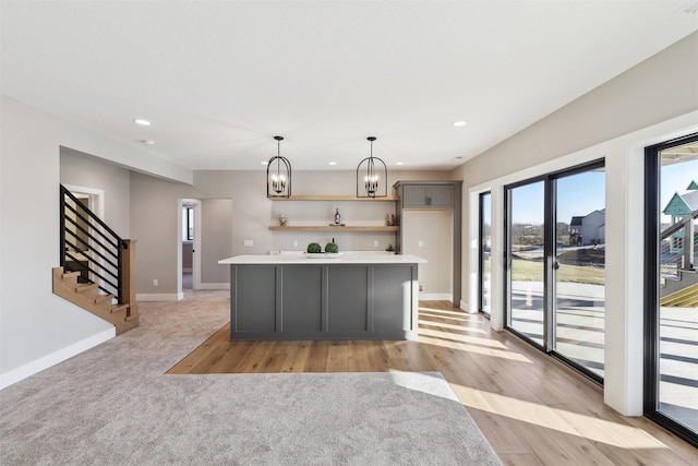 18256 Alderleaf Dr, Clive, IA 50325 - kitchen with gray cabinetry, baseboards, recessed lighting, and a notable chandelier