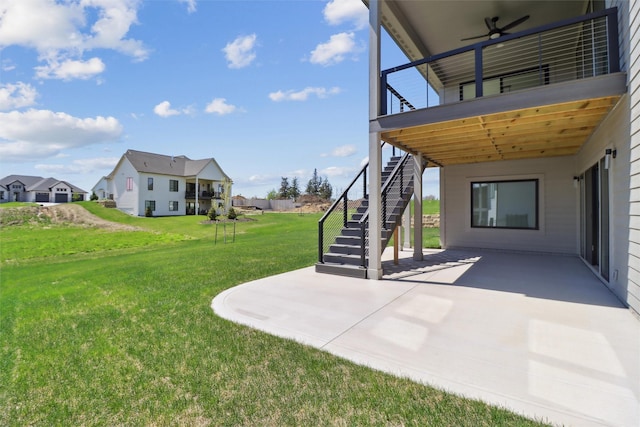 18256 Alderleaf Dr, Clive, IA 50325 - view of yard featuring ceiling fan, a wooden deck, stairs, a patio area, and a residential view