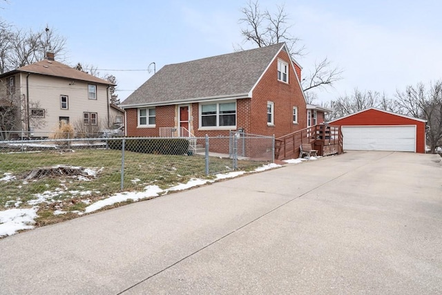 view of front of home featuring an outbuilding and a garage