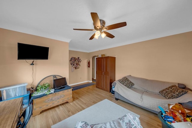 bedroom featuring ceiling fan and light hardwood / wood-style flooring