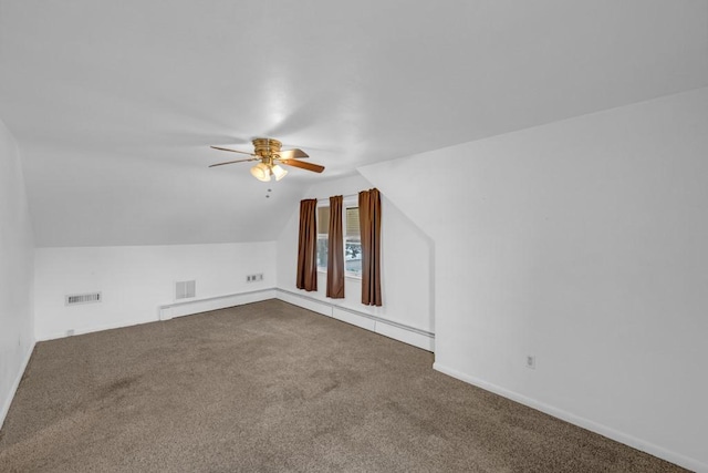 bonus room featuring ceiling fan, lofted ceiling, and carpet