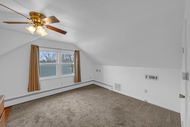 bonus room with lofted ceiling, a baseboard heating unit, ceiling fan, and carpet