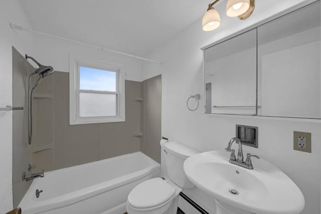 full bathroom featuring sink, toilet, and shower / bathtub combination