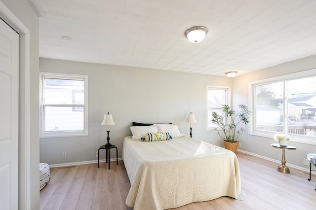 bedroom featuring light hardwood / wood-style floors