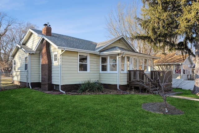 exterior space featuring a front lawn