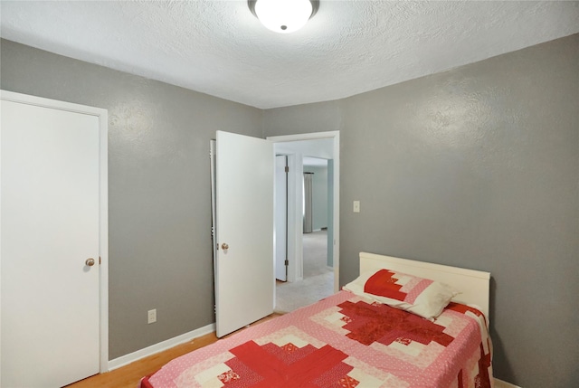 bedroom with a textured ceiling