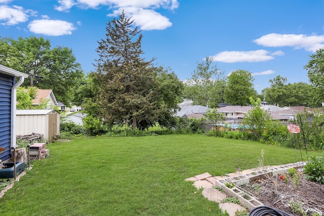 4030 52nd St, Des Moines, IA 50310 - view of yard with a residential view