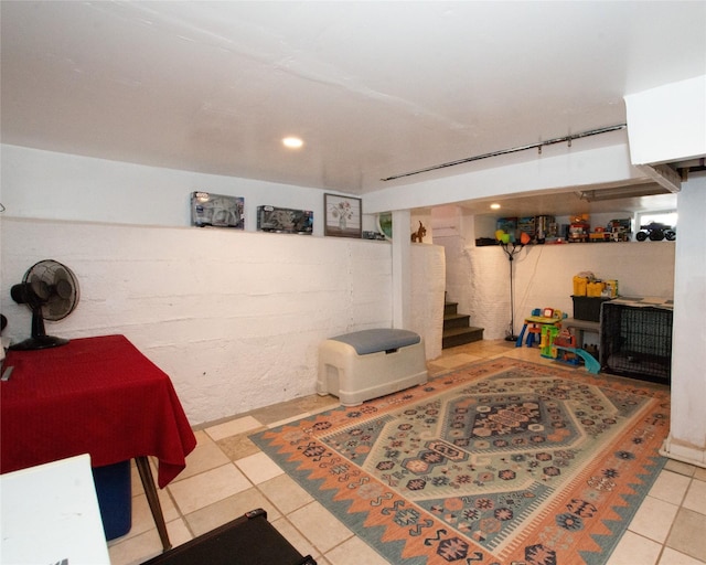 basement with tile patterned floors