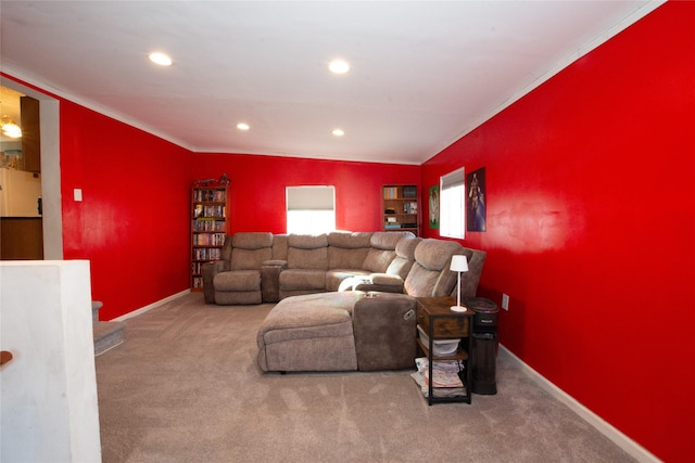 carpeted living room featuring ornamental molding