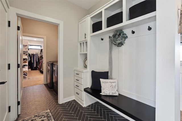 mudroom with washer and dryer