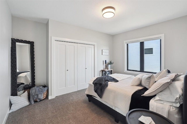 carpeted bedroom with a closet