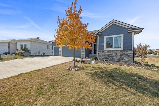 view of front facade with a front yard and a garage