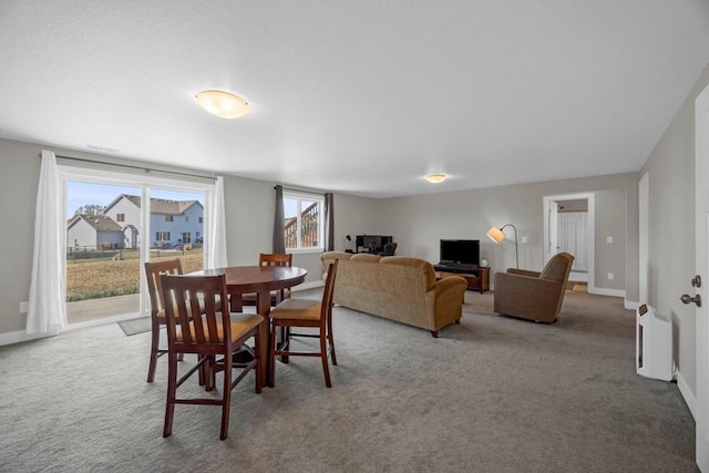 dining area featuring carpet floors